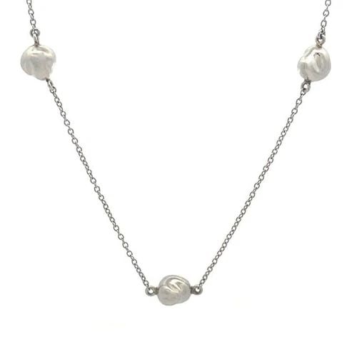 TIFFANY & CO. PERETTI NECKLACE PLATINUM 3 NUGGET MOTIFS CHAIN: TIFFANY & CO. PERETTI NECKLACE PLATINUM 3 NUGGET MOTIFS CHAIN This lovely authentic necklace is from Tiffany & Co. by designer Elsa Peretti from her Nugget Collection. The necklace is crafted from pla