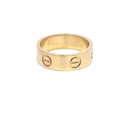 CARTIER CLASSIC LOVE RING 18K YELLOW GOLD SCREW MOTIFS SIZE 50 POUCH PAPER: CARTIER CLASSIC LOVE RING 18K YELLOW GOLD SCREW MOTIFS SIZE 50 POUCH PAPER This Cartier Classic Love Ring is an elegant piece of fine jewelry crafted in 18k yellow gold with screw motifs around the en