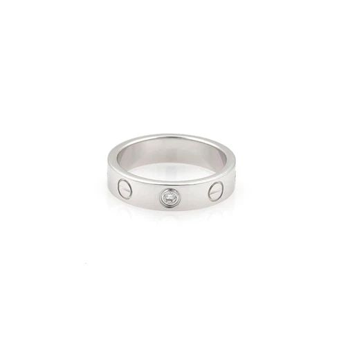 CARTIER LOVE RING MINI 1 DIAMOND 18K WHITE GOLD 4MM BAND SIZE 47-US 4: CARTIER LOVE RING MINI 1 DIAMOND 18K WHITE GOLD 4MM BAND SIZE 47-US 4 The Cartier Love Ring Mini with 1 diamond and a 4mm band in 18k white gold is a stunning piece of fine jewelry perfect for any occ
