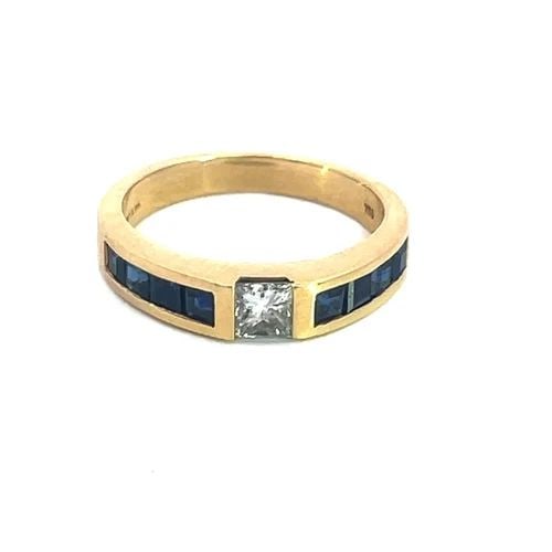 TIFFANY & CO. SAPPHIRE GOLD STACK RING PRINCESS DIAMOND 18K YELLOW: TIFFANY & CO. SAPPHIRE GOLD STACK RING PRINCESS DIAMOND 18K YELLOW This lovely authentic stack band ring is by Tiffany & Co. It is crafted from 18k yellow gold featuring a half bezel set princess cut 