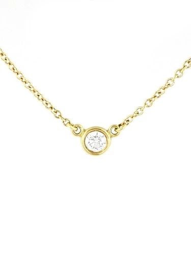 TIFFANY & CO. DIAMOND NECKLACE BY THE YARD 18K YELLOW GOLD SOLITAIRE PENDANT: TIFFANY & CO. DIAMOND NECKLACE BY THE YARD 18K YELLOW GOLD SOLITAIRE PENDANT The Tiffany & Co. Diamond Necklace By The Yard is a stunning piece of fine jewelry crafted in 18k yellow gold. The solitair