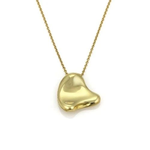 TIFFANY & CO. FULL HEART GOLD PENDANT 18K YELLOW W/ CHAIN: TIFFANY & CO. FULL HEART GOLD PENDANT 18K YELLOW W/ CHAIN This lovely pendant and chain necklace is from Tiffany & Co. by Elsa Peretti from her Full Heart Collection, it is crafted from18k yellow gold