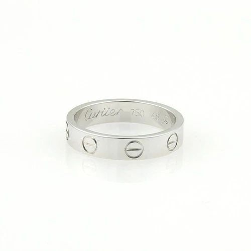 CARTIER MINI LOVE GOLD BAND 18K WHITE 3.5MM RING SIZE 4.5: CARTIER MINI LOVE GOLD BAND 18K WHITE 3.5MM RING SIZE 4.5 The Cartier Mini Love Gold Band 18k White 3.5mm Ring in size 4.5 is a stunning piece of fine jewelry from the Cartier Love Collection. Made wi