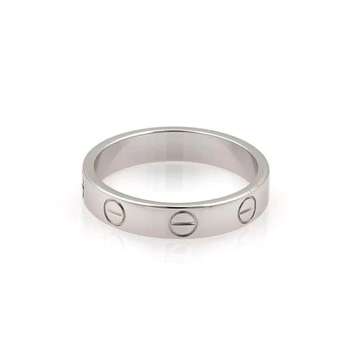CARTIER MINI LOVE RING 18K WHITE GOLD 3.5MM SIZE 49-US 5 CERT.: CARTIER MINI LOVE RING 18K WHITE GOLD 3.5MM SIZE 49-US 5 CERT. The Cartier Mini Love Ring in 18k White Gold is a finely crafted piece of jewelry from the renowned brand Cartier. This stylish ring feat