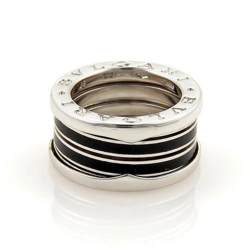 BVLGARI B ZERO-1 BISELOVAN RING 18K WHITE GOLD ENAMEL BAND SIZE EU 46-US 3.5: BVLGARI B ZERO-1 BISELOVAN RING 18K WHITE GOLD ENAMEL BAND SIZE EU 46-US 3.5 The Bvlgari B Zero-1 Biselovan Ring is a stunning piece of fine jewelry crafted from 18k white gold with an enamel band. Th
