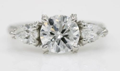 PLATINUM 3.25 TCW VS2 G NATURAL DIAMOND OLD EUROPEAN CENTER ENGAGEMENT RING: PLATINUM 3.25 TCW VS2 G NATURAL DIAMOND OLD EUROPEAN CENTER ENGAGEMENT RING Description Platinum 3.25 TCW Natural Diamond Old European Center Engagement Ring Ring is in great condition. May show signs