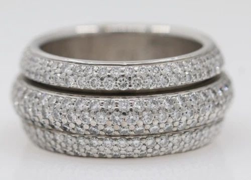 PIAGET POSSESSION 18K WHITE GOLD DIAMOND PAVE ROLLING SPINNER RING SIZE 7 / 54: PIAGET POSSESSION 18K WHITE GOLD DIAMOND PAVE ROLLING SPINNER RING SIZE 7 / 54 Description Piaget Possession 18K White Gold Diamond Pave Rolling Spinner Ring Ring is in good condition. May show signs 
