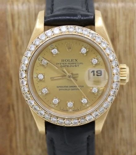 ROLEX PRESIDENT DATEJUST 18K GOLD 26MM CHAMPAGNE DIAL DIAMOND BEZEL WATCH 69178: ROLEX PRESIDENT DATEJUST 18K GOLD 26MM CHAMPAGNE DIAL DIAMOND BEZEL WATCH 69178 Description Rolex President Datejust 18k Yellow Gold 26mm Champagne Diamond Dial & Diamond Bezel Watch 69178 The watch h
