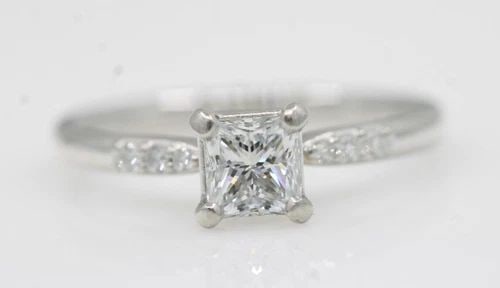 PLATINUM GIA VVS1 E 0.75 TCW NATURAL DIAMOND PRINCESS ENGAGEMENT RING SIZE 6.5: PLATINUM GIA VVS1 E 0.75 TCW NATURAL DIAMOND PRINCESS ENGAGEMENT RING SIZE 6.5 Description Platinum GIA VVS1 E 0.75 TCW Natural Diamond Princess Engagement Ring The ring is in great condition. May sho