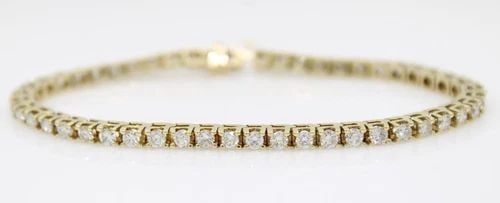14K YELLOW GOLD 4 TCW NATURAL DIAMOND TENNIS BRACELET 7" - 11.5 GRAMS: 14K YELLOW GOLD 4 TCW NATURAL DIAMOND TENNIS BRACELET 7" - 11.5 GRAMS 14K YELLOW GOLD 4 TCW NATURAL DIAMOND TENNIS BRACELET 7" - 11.5 GRAMS Description 14K Yellow Gold 4 TCW Natural Diamond Tennis Bra