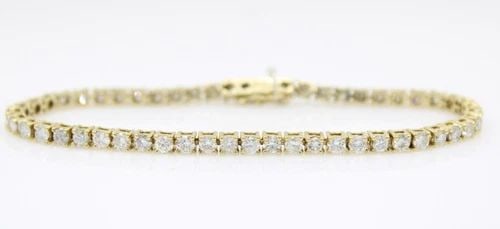 14K YELLOW GOLD 4.25 TCW NATURAL DIAMOND TENNIS BRACELET 7" - 9.9 GRAMS: 14K YELLOW GOLD 4.25 TCW NATURAL DIAMOND TENNIS BRACELET 7" - 9.9 GRAMS 14K YELLOW GOLD 4.25 TCW NATURAL DIAMOND TENNIS BRACELET 7" - 9.9 GRAMS Description 14K Yellow Gold 4.25 TCW Natural Diamond Ten