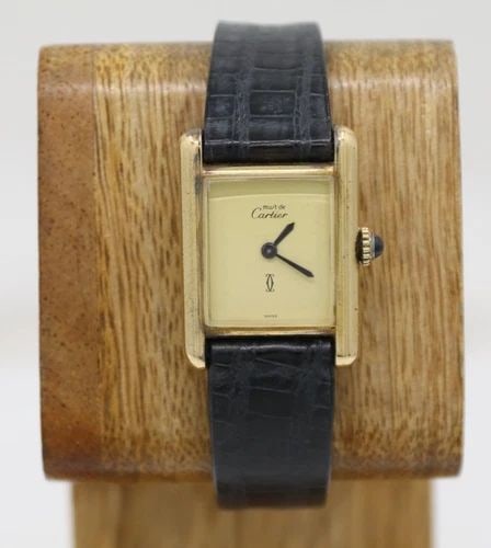 CARTIER MUST DE TANK STERLING VERMEIL 20MM X 28MM LEMON DIAL MANUAL WIND WATCH: CARTIER MUST DE TANK 20MM X 28MM LEMON DIAL 925 SAPPHIRE DIAL WATCH Description Cartier Must De Tank Lemon Dial 925 Sapphire Dial Watch The watch has been used previously. The watch may have some sign
