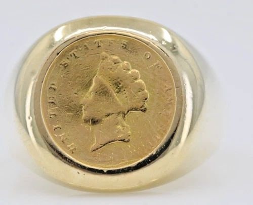 1855 O $1 INDIAN PRINCESSES GOLD DOLLAR COIN IN 14K YELLOW GOLD RING 15.2G: 1855 O $1 INDIAN PRINCESSES GOLD DOLLAR COIN IN 14K YELLOW GOLD RING 15.2G 1855 O $1 INDIAN PRINCESSES GOLD DOLLAR COIN IN 14K YELLOW GOLD RING 15.2G Description 1855 O $1 Indian Princesses Gold Dolla
