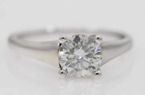 14K WHITE GOLD GIA 1 CT ROUND SI1 / H NATURAL DIAMOND SOLITAIRE ENGAGEMENT RING: 14K WHITE GOLD GIA 1 CT ROUND SI1 / H NATURAL DIAMOND SOLITAIRE ENGAGEMENT RING Description 14K White Gold GIA 1 CT Round SI1 / H Natural Diamond Solitaire Engagement Ring Ring is in excellent conditi