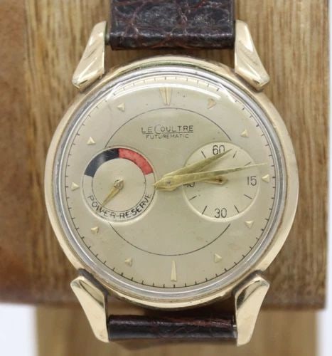 VINTAGE LECOULTRE FUTUREMATIC AUTOMATIC POWER RESERVE 34MM 10K GOLD FILLED WATCH: VINTAGE LECOULTRE FUTUREMATIC AUTOMATIC POWER RESERVE 34MM 10K GOLD FILLED WATCH Description Vintage 1950's LeCoultre Futurematic Automatic Power Reserve 34mm 10k Gold Filled Watch The watch has been 