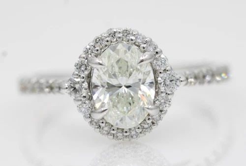 14K WHITE GOLD GIA NATURAL 1.25 TCW OVAL DIAMOND HALO ENGAGEMENT RING SIZE 5: 14K WHITE GOLD GIA NATURAL 1.25 TCW OVAL DIAMOND HALO ENGAGEMENT RING SIZE 5 14K WHITE GOLD GIA NATURAL 1.25 TCW OVAL DIAMOND HALO ENGAGEMENT RING SIZE 5 Description 14K White Gold GIA Natural 1.25 TC