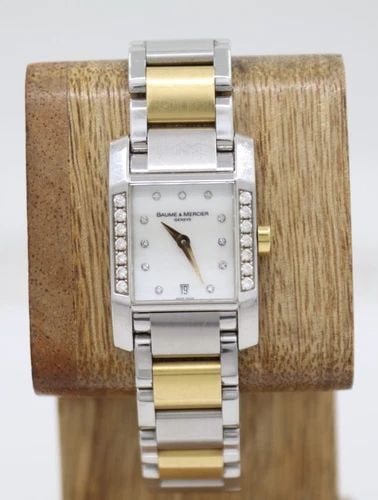 BAUME & MERCIER DIAMANT 33MM X 22MM MOP DIAL DIAMOND BEZEL & DIAL WATCH 8599: BAUME & MERCIER DIAMANT 33MM X 22MM MOP DIAL DIAMOND BEZEL & DIAL WATCH 8599 Description Baume & Mercier Diamant 33mm X 22mm MOP Dial Diamond Bezel & Dial Watch 8599 The watch has been used previously