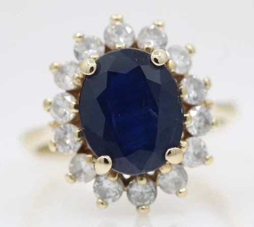 EFFY BH 14K YELLOW GOLD 3.75 TCW NATURAL BLUE SAPPHIRE DIAMOND HALO DIANA RING: EFFY BH 14K YELLOW GOLD 3.75 TCW NATURAL BLUE SAPPHIRE DIAMOND HALO DIANA RING Description 14K Yellow Gold 3.75 TCW Natural Blue Sapphire Diamond Halo Diana Ring Ring is in good condition. May show si