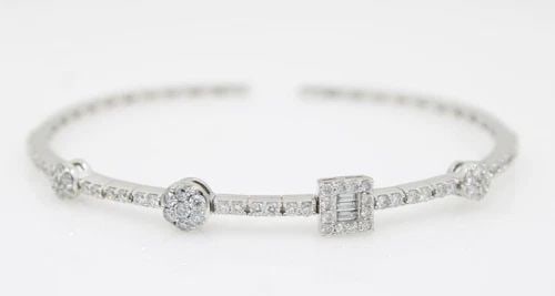 18K WHITE GOLD 1.24 TCW NATURAL DIAMOND CUFF BRACELET 7" - 8.9 GRAMS: 18K WHITE GOLD 1.24 TCW NATURAL DIAMOND CUFF BRACELET 7" - 8.9 GRAMS 18K WHITE GOLD 1.24 TCW NATURAL DIAMOND CUFF BRACELET 7" - 8.9 GRAMS Description 18K White Gold 1.24 TCW Natural Diamond Cuff Brace