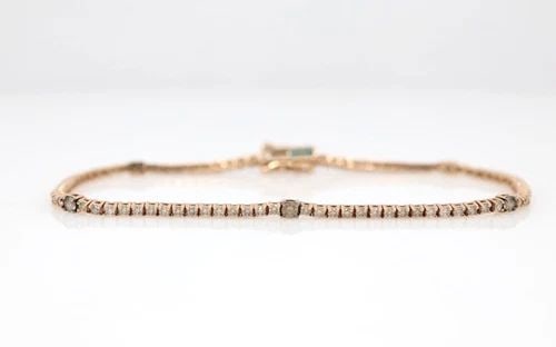 LE VIAN 14K ROSE GOLD DIAMOND TENNIS BRACELET: LE VIAN 14K ROSE GOLD DIAMOND TENNIS BRACELET Description Le Vian 14K Rose Gold Diamond Tennis Bracelet Bracelet is in good condition. May show signs of wear and/or tear. Approximate Measurements Brac