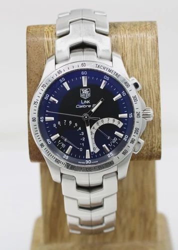 TAG HEUER LINK CALIBRE S 42MM BLACK CHRONOGRAPH DIAL QUARTZ WATCH CJF7110 W/ BOX: TAG HEUER LINK CALIBRE S 42MM BLACK CHRONOGRAPH DIAL QUARTZ WATCH CJF7110 W/ BOX Description TAG Heuer Link Calibre S 42mm Black Chronograph Dial Quartz Watch CJF7110 The watch has been used previousl