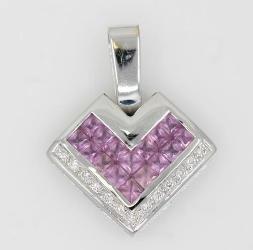 LEVIAN 18K WHITE GOLD PINK SAPPHIRE & DIAMOND PENDANT 1" ~ 6.5 GR: LEVIAN 18K WHITE GOLD PINK SAPPHIRE & DIAMOND PENDANT 1" ~ 6.5 GR Description Levian 18K White Gold Pink Sapphire & Diamond Pendant Pendant is in good condition. May show signs of wear and/or tear. Ap