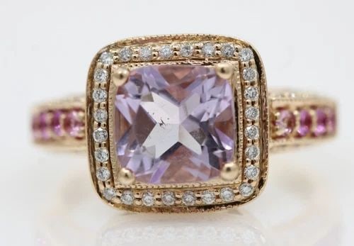 LEVIAN 14K STRAWBERRY GOLD AMETHYST, SAPPHIRE & DIAMOND RING SIZE 6.5 - 6 GRAMS: LEVIAN 14K STRAWBERRY GOLD AMETHYST, SAPPHIRE & DIAMOND RING SIZE 6.5 - 6 GRAMS Description LeVian 14k Strawberry Gold Amethyst, Sapphire & Diamond Ring Ring is in good condition. May show signs of we
