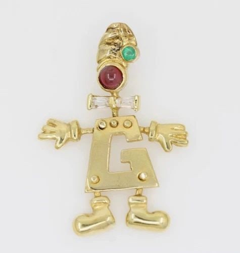 DESIGNER 18K YELLOW GOLD EMERALD & DIAMOND 1.25" G PENDANT 3.9 GRAMS: DESIGNER 18K YELLOW GOLD EMERALD & DIAMOND 1.25" G PENDANT 3.9 GRAMS DESIGNER 18K YELLOW GOLD EMERALD & DIAMOND 1.25" G PENDANT 3.9 GRAMS Description Designer 18K Yellow Gold Emerald & Diamond 1.25" G