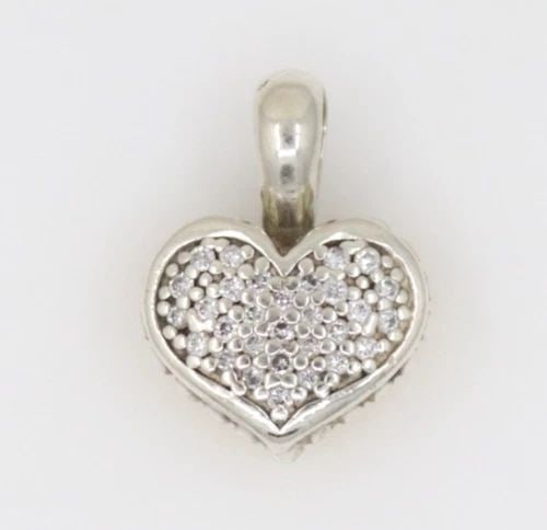 LOGOS STERLING SILVER & 18K YELLOW GOLD DIAMOND HEART PENDANT - 7 GRAMS: LOGOS STERLING SILVER & 18K YELLOW GOLD DIAMOND HEART PENDANT - 7 GRAMS Description Logos Sterling Silver & 18k Yellow Gold Diamond Heart Pendant Pendant is in good condition. May show signs of wear. 