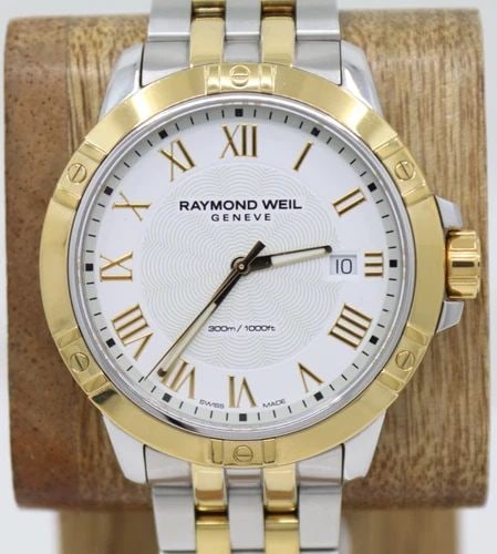 RAYMOND WEIL TANGO 41MM WHITE DATE DIAL TWO-TONE QUARTZ WATCH W/ BOX 81601: RAYMOND WEIL TANGO 41MM WHITE DATE DIAL TWO-TONE QUARTZ WATCH W/ BOX 81601 Description Raymond Weil 41mm White Date Dial Two-Tone Quartz Watch W/ Box 81601 The watch has been used previously. The watc