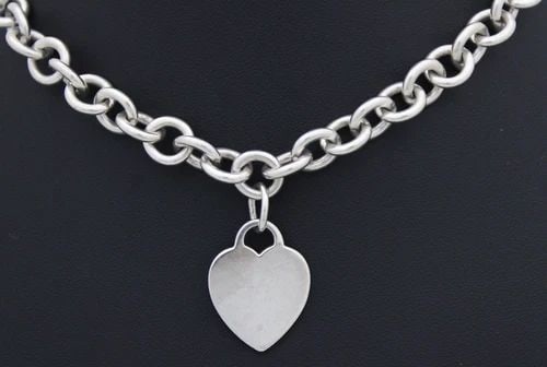 TIFFANY & CO. STERLING SILVER 10MM LINK HEART TAG NECKLACE 19" ~ 87 GRAMS: TIFFANY & CO. STERLING SILVER 10MM LINK HEART TAG NECKLACE 19" ~ 87 GRAMS TIFFANY & CO. STERLING SILVER 10MM LINK HEART TAG NECKLACE 19" ~ 87 GRAMS Description Tiffany & Co. Sterling Silver 10mm Link 