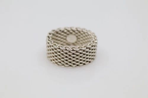 TIFFANY & CO. STERLING SILVER 10MM SOMERSET MESH BAND RING SIZE 6.5: TIFFANY & CO. STERLING SILVER 10MM SOMERSET MESH BAND RING SIZE 6.5 Description Tiffany & Co. Sterling Silver 10mm Somerset Mesh Band Ring Item is in good condition. May show signs of wear and/or tear