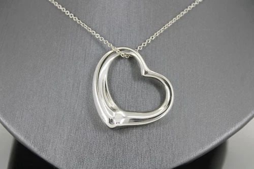 TIFFANY ELSA PERETTI STERLING SILVER 35MM OPEN HEART PENDANT 31" CHAIN NECKLACE: TIFFANY ELSA PERETTI STERLING SILVER 35MM OPEN HEART PENDANT 31" CHAIN NECKLACE TIFFANY ELSA PERETTI STERLING SILVER 35MM OPEN HEART PENDANT 31" CHAIN NECKLACE Description Tiffany Elsa Peretti Sterlin