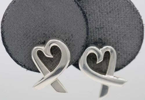 TIFFANY & CO. STERLING SILVER PALOMA PICASSO LOVING HEART STUD EARRINGS: TIFFANY & CO. STERLING SILVER PALOMA PICASSO LOVING HEART STUD EARRINGS Description Tiffany & Co. Sterling Silver Paloma Picasso Loving Heart Stud Earrings Earrings are in good condition. May show sig