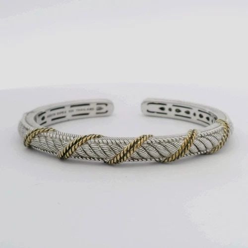 JUDITH RIPKA STERLING SILVER TWO TONE CABLE ROPE DESIGN HINGED CUFF BRACELET: JUDITH RIPKA STERLING SILVER TWO TONE CABLE ROPE DESIGN HINGED CUFF BRACELET Description Judith Ripka Sterling Silver Two Tone Cable Rope Design Hinged Cuff Bracelet Item is in good condition. May sho