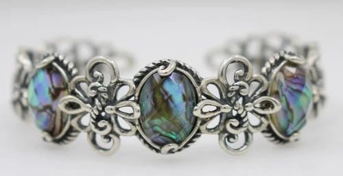 CAROLYN POLLACK RELIOS STERLING SILVER ABALONE CUFF BRACELET 6" - 22.7 GRAMS: CAROLYN POLLACK RELIOS STERLING SILVER ABALONE CUFF BRACELET 6" - 22.7 GRAMS Description Carolyn Pollack Relios Sterling Silver Abalone Cuff Bracelet Bracelet is in good condition. May show signs of w