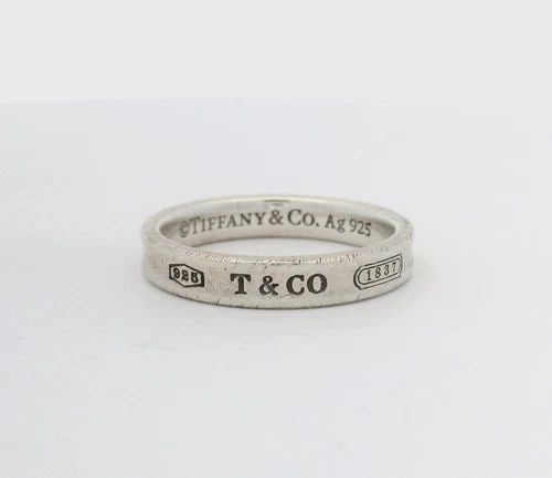 TIFFANY & CO. 1837 STERLING SILVER NARROW 4MM CONCAVE BAND RING SIZE 9: TIFFANY & CO. 1837 STERLING SILVER NARROW 4MM CONCAVE BAND RING SIZE 9 Description Tiffany & Co. 1837 Sterling Silver Narrow 4mm Concave Band Ring Item is in good condition. Shows signs of wear and/or
