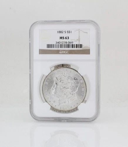 1882 S $1 MORGAN SILVER DOLLAR NGC MS 63: 1882 S $1 MORGAN SILVER DOLLAR NGC MS 63 1882 S $1 MORGAN SILVER DOLLAR NGC MS 63 Description 1882 S $1 Morgan Silver Dollar NGC MS 63 Coin is in great condition. Plastic covering may show signs of we