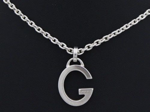 GUCCI STERLING SILVER G LOGO PENDANT NECKLACE 17" W/ BOX/POUCH 19.2 GRAMS: GUCCI STERLING SILVER G LOGO PENDANT NECKLACE 17" W/ BOX/POUCH 19.2 GRAMS Description Gucci Sterling Silver G Logo Pendant Necklace 17" w/ Box/Pouch Pendant & chain is in good condition. May show sign