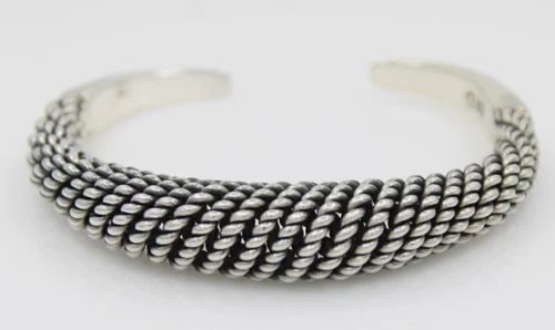 STERLING SILVER 925 CUFF BRACELET 6" - 49 GRAMS: STERLING SILVER 925 CUFF BRACELET 6" - 49 GRAMS Description Sterling Silver 925 Cuff Bracelet 6" - 49 Grams Bracelet is in good condition. May show signs of wear and/or tear. Approximate Measurements 