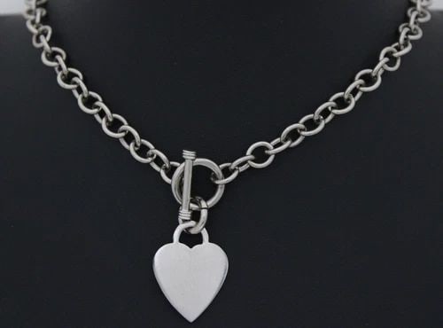 STERLING SILVER 16" CABLE CHAIN NECKLACE WITH 1" HEART TAG PENDANT ~ 45.7 GRAMS: STERLING SILVER 16" CABLE CHAIN NECKLACE WITH 1" HEART TAG PENDANT ~ 45.7 GRAMS Description Sterling Silver 16" Cable Chain Necklace with 1" Heart Tag Pendant Necklace in great condition. May show sig