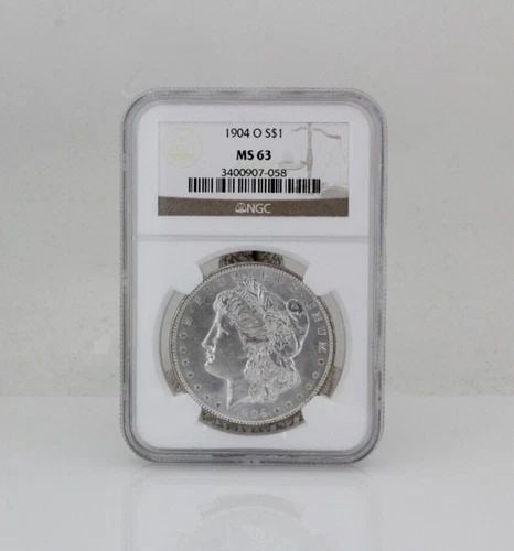 1904-O MORGAN SILVER DOLLAR $1 NGC MS63: 1904-O MORGAN SILVER DOLLAR $1 NGC MS63 Description 1904-O Morgan Silver Dollar $1 NGC MS63 Coin is in great condition. Plastic holder may show signs of wear and/or tear. The listing is for the coin o