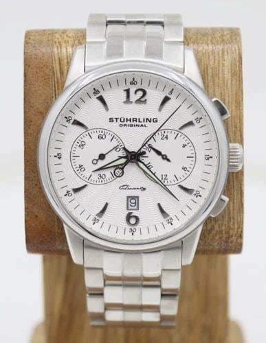 STUHRLING ORIGINAL STAINLESS STEEL 43MM WHITE DATE DIAL QUARTZ WATCH: STUHRLING ORIGINAL STAINLESS STEEL 43MM WHITE DATE DIAL QUARTZ WATCH Description Stuhrling Original Stainless Steel 43mm White Date Dial Quartz Watch The watch has been used previously. The watch may 