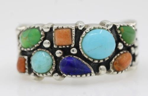 NK STERLING SILVER THAILAND MULTICOLOR GEMSTONE RING SIZE 9 - 8.4 GRAMS: NK STERLING SILVER THAILAND MULTICOLOR GEMSTONE RING SIZE 9 - 8.4 GRAMS Description NK Sterling Silver Thailand Multicolor Gemstone Ring Ring is in good condition. May show signs of wear and/or tear. 