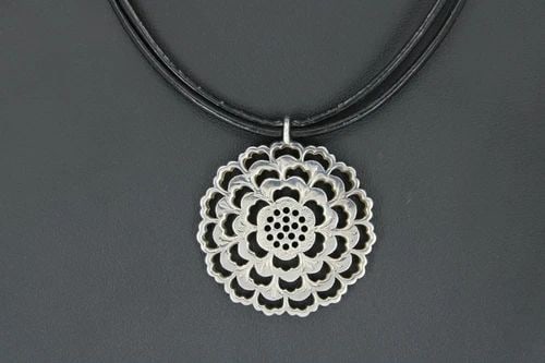 STERLING SILVER FLOWER NECKLACE W/ BLACK LEATHER CORD 18" NECKLACE 23.6 GRAMS: STERLING SILVER FLOWER NECKLACE W/ BLACK LEATHER CORD 18" NECKLACE 23.6 GRAMS Description Sterling Silver Flower Necklace w/ Black Leather Cord 18" Necklace Item is in great condition. May show signs 