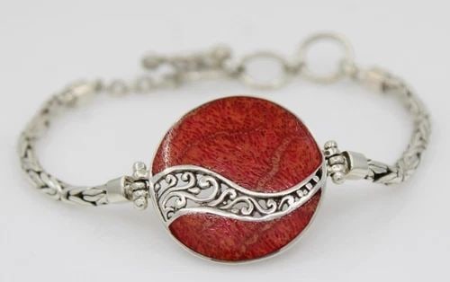 RED CORAL PENDANT W/ FILIGREED STERLING SILVER WAVES BRACELET 7": RED CORAL PENDANT W/ FILIGREED STERLING SILVER WAVES BRACELET 7" Description Red Coral Pendant w/ Filigreed Sterling Silver Waves Bracelet Bracelet is in good condition. May show signs of wear and/or 
