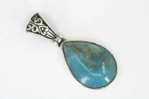 VINTAGE STERLING SILVER PEAR SHAPED TURQUOISE PENDANT W/ DECORATIVE BAIL 3.1 G: VINTAGE STERLING SILVER PEAR SHAPED TURQUOISE PENDANT W/ DECORATIVE BAIL 3.1 G Description Vintage Sterling Silver Pear Shaped Turquoise Pendant w/Decorative Bail Item is in good condition. May show s
