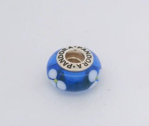 PANDORA STERLING SILVER MURANO BLUE AND WHITE FLOWER GLASS CHARM 790609: PANDORA STERLING SILVER MURANO BLUE AND WHITE FLOWER GLASS CHARM 790609 Description PANDORA Sterling Silver MURANO BLUE AND WHITE FLOWER Glass Charm 790609 Item is in good condition. May show signs of
