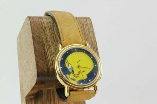 ARMITRON TWEDDY BIRD WARNER BROS BLUE DIAL GREEN LEATHER BAND WATCH 2200/76: ARMITRON TWEDDY BIRD WARNER BROS BLUE DIAL GREEN LEATHER BAND WATCH 2200/76 Description ARMITRON TWEDDY BIRD WARNER BROS BLUE DIAL GREEN LEATHER BAND WATCH 2200/76 New battery Installed. In great work