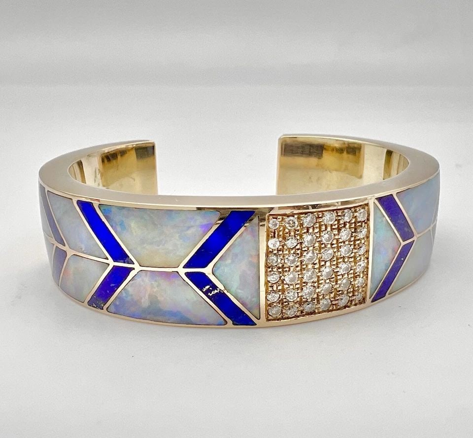 NAVAJO 14K YELLOW GOLD AUSTRALIAN FIRE OPAL & LAPIS LAZULI DIAMOND CUFF BRACELET: NAVAJO 14K YELLOW GOLD AUSTRALIAN FIRE OPAL & LAPIS LAZULI DIAMOND CUFF BRACELET Vtg Navajo 14K Yellow Gold Australian Fire Opal & Lapis Lazuli Diamond Cuff Bracelet Cuff is 5 1/4" Tip to Tip and has 